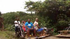 Villagers build motorcycle-powered wooden train