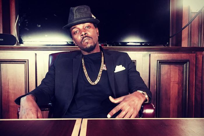 Kwaw Kese with a hat