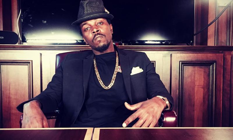 Kwaw Kese with a hat