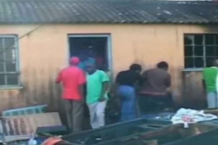 Neighbours at the burnt house