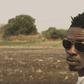 Shatta Wale stares at Prince Dovlo's camera in "Too Much Chemical" music video