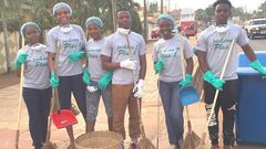Students of Lancaster University clean-up part the Jungle Avenue, American House