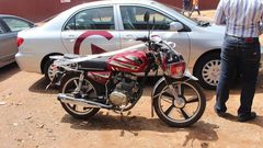GHAMRO presents car and motorbike to office in Ashanti Region