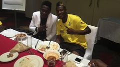 Shatta Wale poses with Asamoah Gyan [right]
