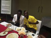Shatta Wale poses with Asamoah Gyan [right]