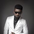 Bisa Kdei in white suit