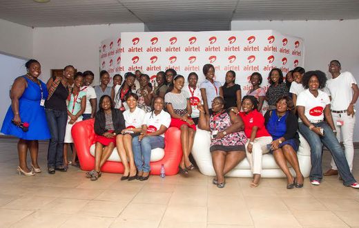 Some ladies of Airtel Ghana in a group photograph with Ms. Efua Addotey after the event.