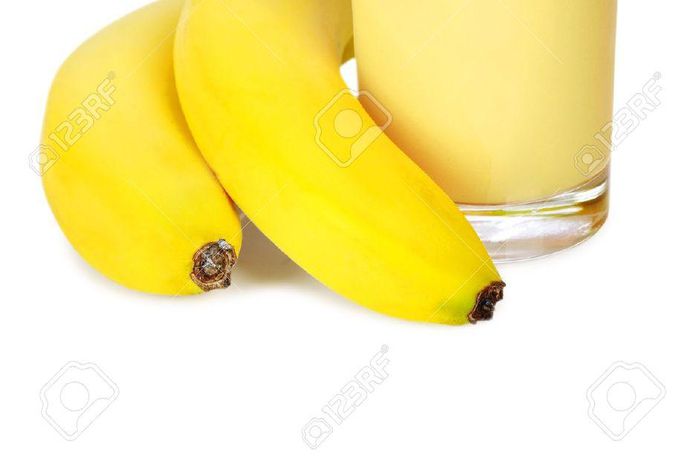 ___4576724___https:______static.pulse.com.gh___webservice___escenic___binary___4576724___2016___1___19___12___13911956-Banana-smoothie-inl-glass-on-white-background-Stock-Photo-juice