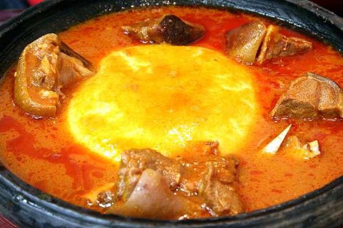 Yam 'fufu' and goat light soup