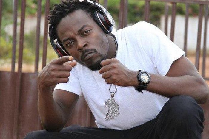 Kwaw Kese with a headset