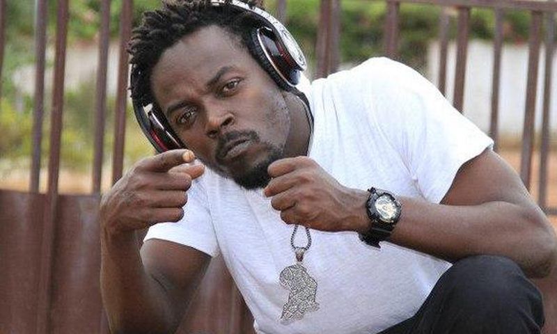 Kwaw Kese with a headset