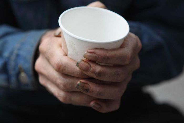 ___4569849___https:______static.pulse.com.gh___webservice___escenic___binary___4569849___2016___1___18___9___A-homeless-man-holds-a-cup