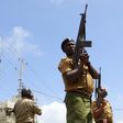 Police hold their positions outside the Masjid Mussa mosque as they attempt to suppress demonstrators reacting to the killing of an Islamic cleric at Kenya's coastal city of Mombasa October 4, 2013. REUTERS/Joseph Okanga