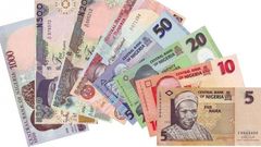 Naira devalues further against dollar at N372 to $1