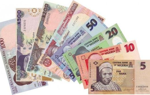 Naira devalues further against dollar at N372 to $1