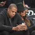 Beyonce Pictured Peeping Into Husband Jay-Z's Phone During Basket Ball Game