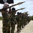 Al Shabaab militants parade new recruits after arriving in Mogadishufrom their training camp south of the capital in this October 21, 2010 file photo. REUTERS/Feisal Omar/Files