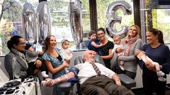 James Harrison with babies saved by blood