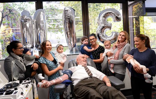 James Harrison with babies saved by blood