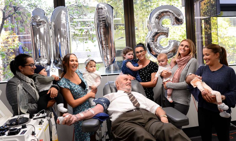 James Harrison with babies saved by blood