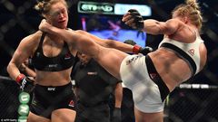 Holly Holm beats Ronda Rousey