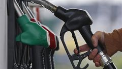 ___4284198___https:______static.pulse.com.gh___webservice___escenic___binary___4284198___2015___10___22___13___455174-a-customer-prepares-to-fill-the-tank-of-her-car-at-a-fuel-station
