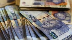 South Africa's rand posts modest gain, stocks ease
