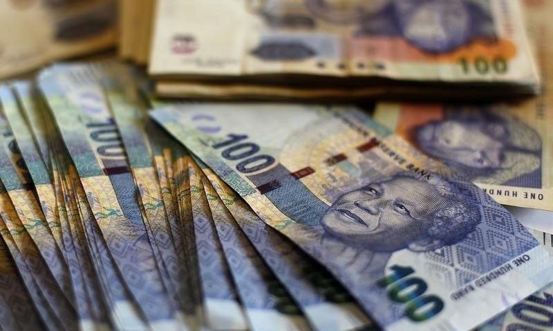 South Africa's rand posts modest gain, stocks ease