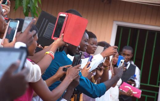 If you are not the official photographer, don't distract others. Don't run around taking pictures of every moment.