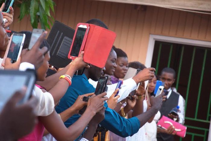 If you are not the official photographer, don't distract others. Don't run around taking pictures of every moment.