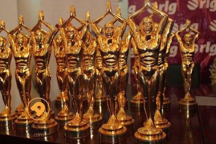 ___4480049___https:______static.pulse.com.gh___webservice___escenic___binary___4480049___2015___12___19___11___ghana-movie-awards-statuette-4
