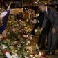Obama visits Paris attack site, pays tribute to victims