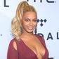 Beyonce stuns in low cut dress at Tidal concert in Brooklyn
