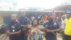 A spare parts dealer at Suame had to be forcibly removed by armed Policemen from her shop before it could be closed down