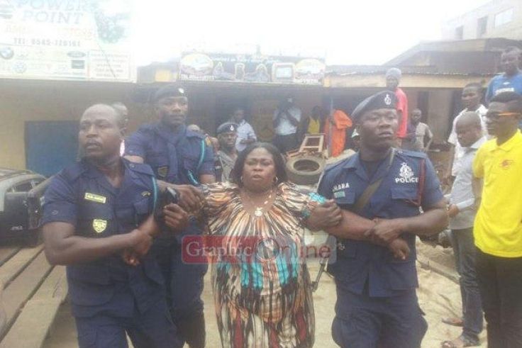 A spare parts dealer at Suame had to be forcibly removed by armed Policemen from her shop before it could be closed down