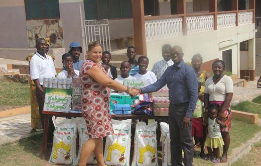 Maria Kivivuori, Acting Proprietress thanks West Hills Mall Manager, Eric Koranteng for the donation