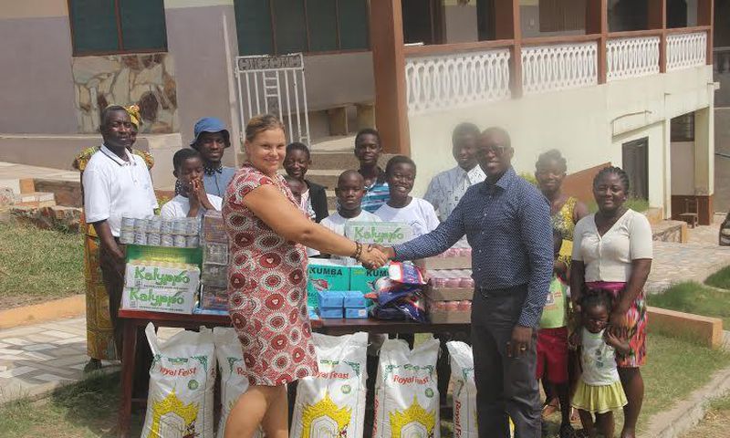 Maria Kivivuori, Acting Proprietress thanks West Hills Mall Manager, Eric Koranteng for the donation
