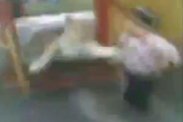 Attack: Blurry footage show the lion snatch at the child's coat