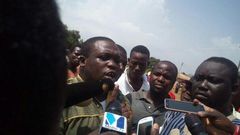 Sam George addressing the media