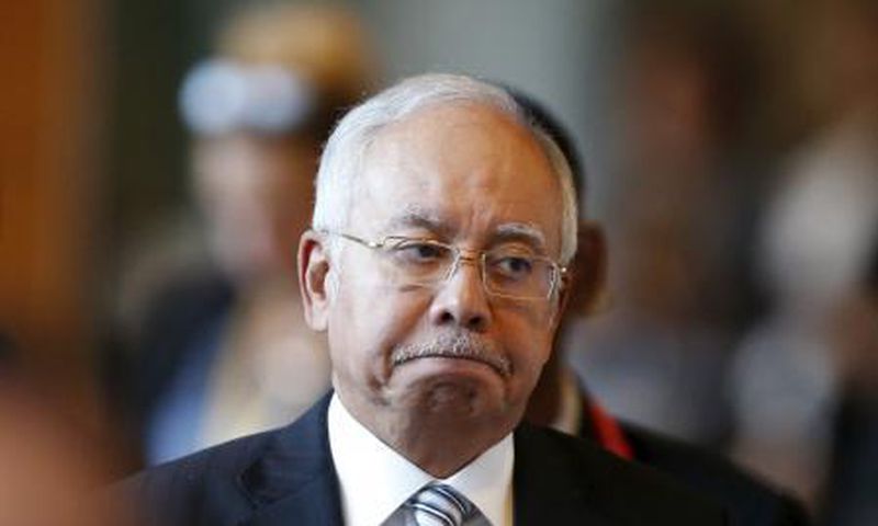 Malaysia"s Prime Minister Najib Razak arrives at a session of the 27th Association of Southeast Asian Nations (ASEAN) Summit in Kuala Lumpur, November 21, 2015.