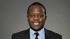 Adolph Okine, Ph.D. Student in Actuarial Science, Risk Management, and Insurance, holds his recent Best Paper Award.