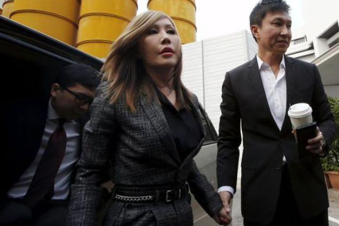 City Harvest Church founder, Kong Hee and his wife, Sun Ho, also known as Ho Yeow Sun, arrive at the State Courts in Singapore