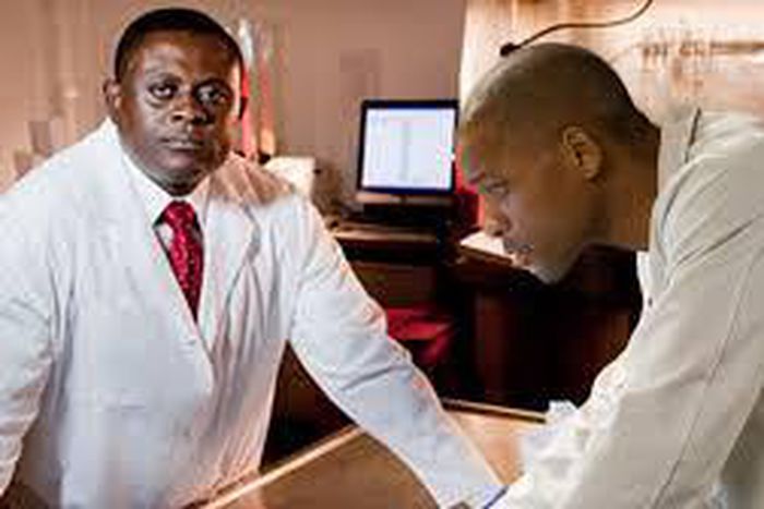 Smith plays the role of a Nigerian Doctor in the film.