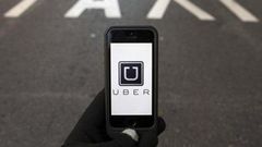 Three Goldman bankers leave for Uber as tech world raids Wall St talent