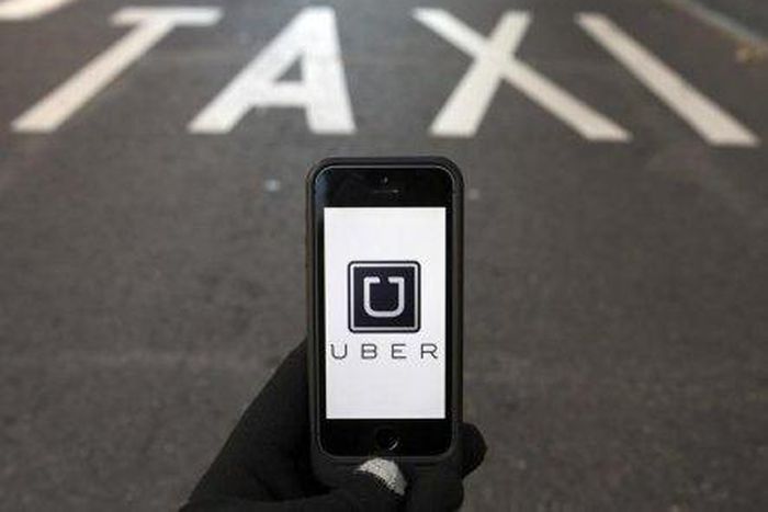 Three Goldman bankers leave for Uber as tech world raids Wall St talent