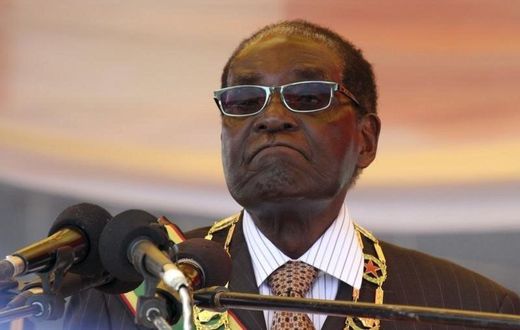 President Robert Mugabe waits to address crowds gathered for Zimbabwe's Heroes Day commemorations in Harare, August 10, 2015. REUTERS/Philimon Bulawayo
