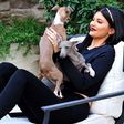 Kylie Jenner plays with her dogs