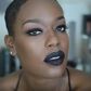 Destiny Godley wears a dark makeup look