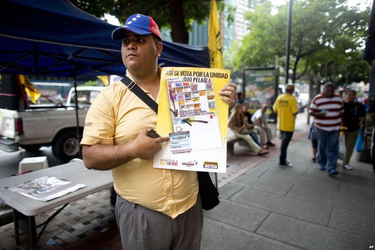 Venezuela says opposition activist killing was gang-related