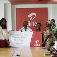 Hilary Denise Arko-Dadzie (3rd from left), from Airtel Ghana making the presentation to Mr. Kwaku Sarkodie, representative of Village of Hope Orphanage